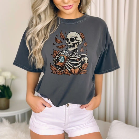 Skeleton with leaves and coffee