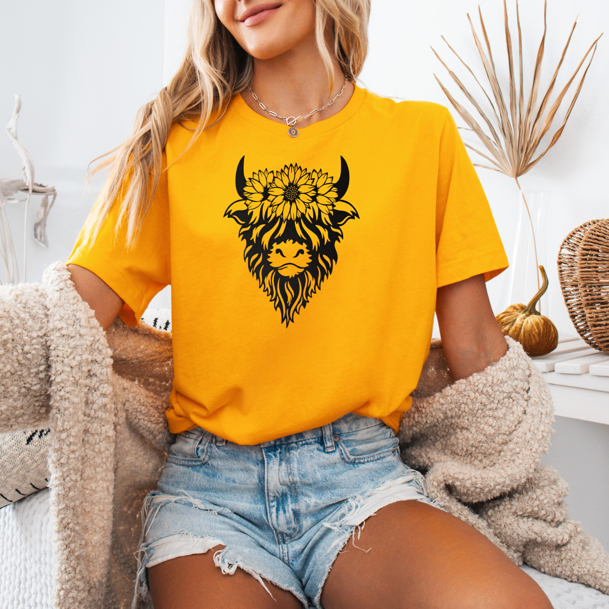 Highland with sunflowers on head