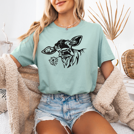 Cow with flowers in mouth