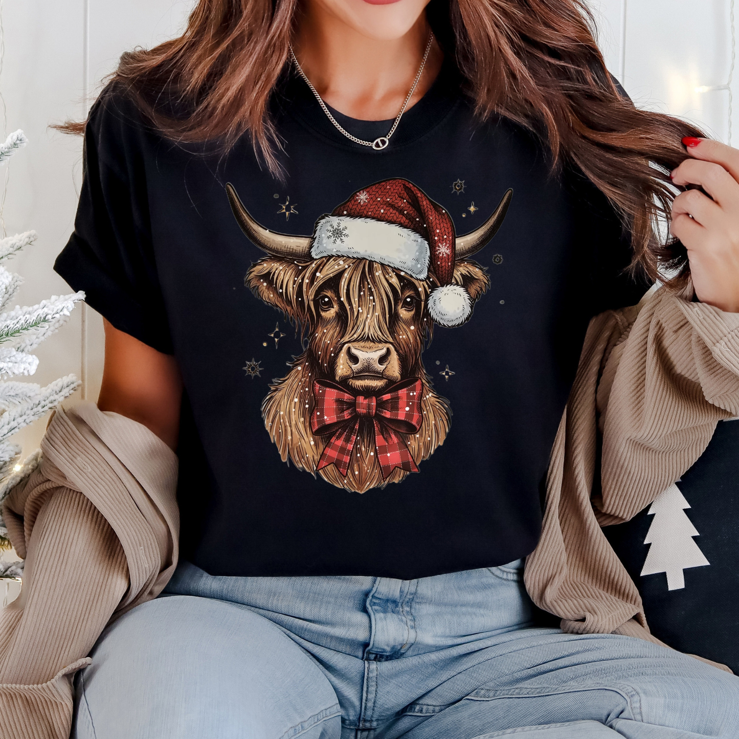 Highland with santa hat and bow